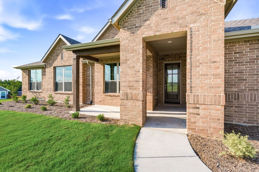 Exterior details and patio area of a home in Saddleback Estates, Boyd (Image 4).