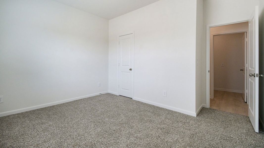 Spacious, unfurnished interior of a new home in Revelry, Del Valle (Image 21).