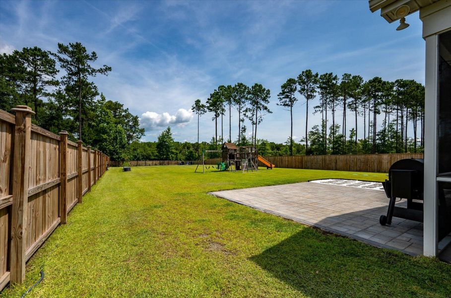 Exterior details and patio area of a home in The Enclave at French Quarter Creek, Huger (Image 3).