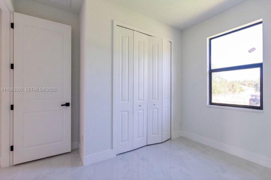 Spacious, unfurnished interior of a new home in , Lehigh Acres (Image 33).