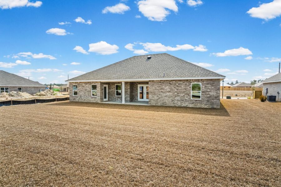 Exterior details and patio area of a home in Natureview, Freeport (Image 20).