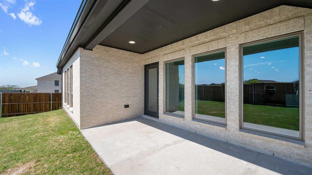 Exterior details and patio area of a home in Devonshire, Forney (Image 3).