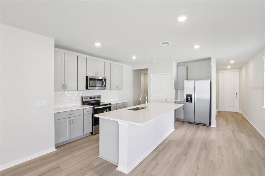 Furnished interior view inside a new home in Crescent Lakes - Premier Series, Punta Gorda (Image 7).