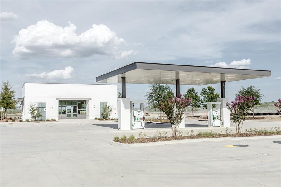 Village market with gas pumps