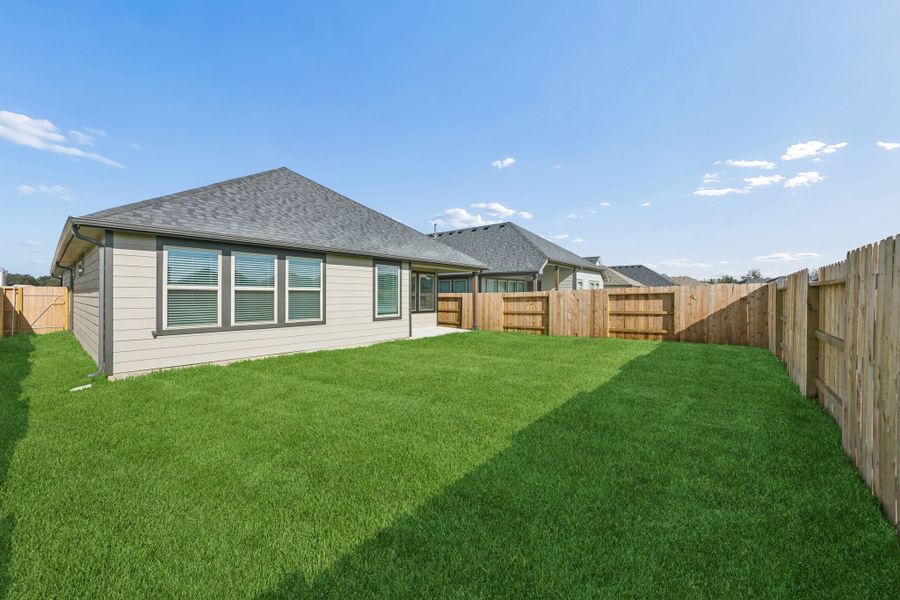 Exterior details and patio area of a home in Riviera Pines, Huffman (Image 23).
