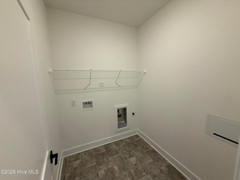 Spacious, unfurnished interior of a new home in Wood Creek Landing, Leland (Image 26).