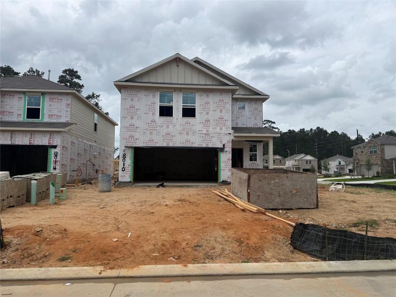 In-progress construction of a new home in Lakes at Black Oak, Magnolia, TX (Image 17).