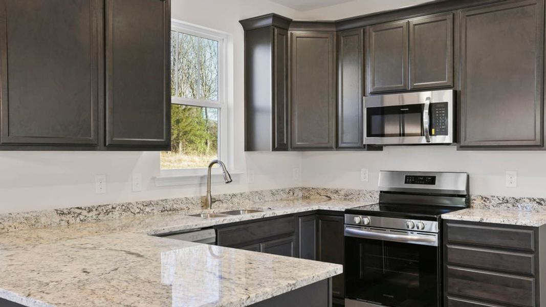 Furnished interior view inside a new home in Edgewood Estates, Greenville (Image 9).