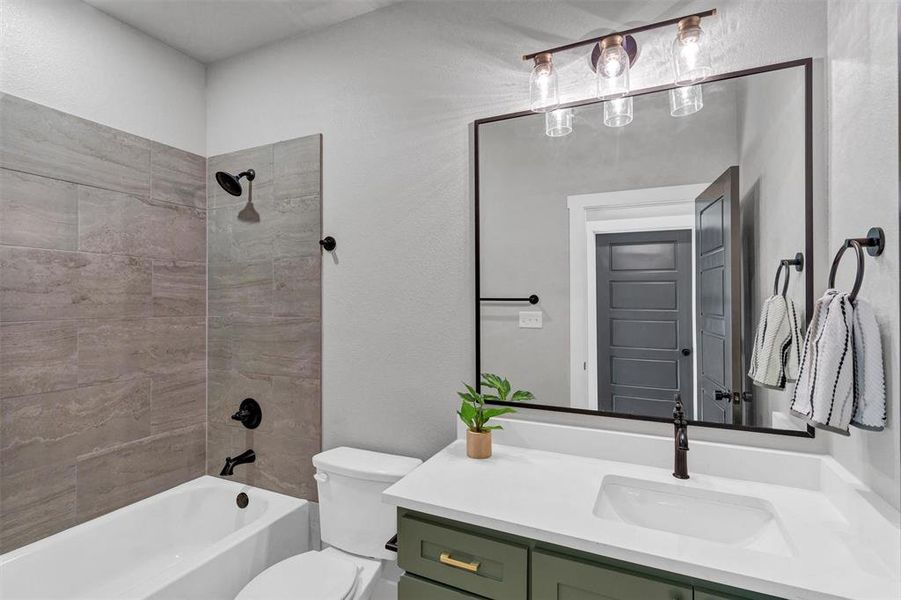 Bathroom featuring shower combination and vanity Bathroom featuring shower combination and vanity