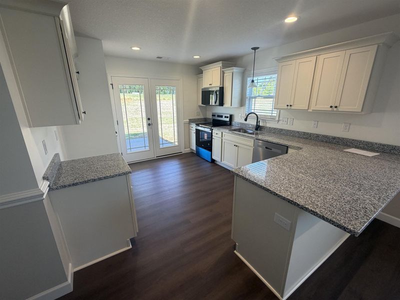 Furnished interior view inside a new home in Stones Throw, Inman (Image 4).