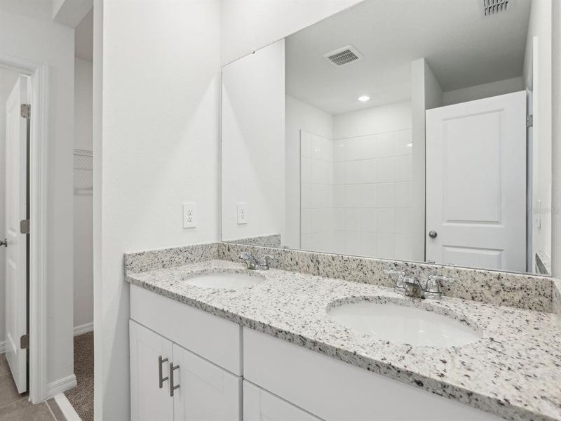 Furnished interior view inside a new home in The Reserve at Van Oaks, Auburndale (Image 12).
