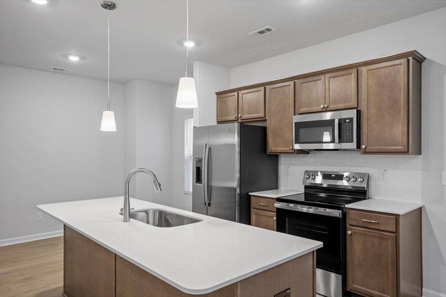 Furnished interior view inside a new home in Renaissance at White Oak, Garner (Image 7).