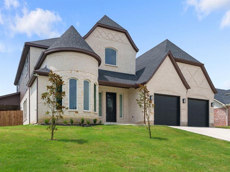 Front exterior of a new home in , Denison, TX, highlighting curb appeal (Image 2). Front exterior of a new home in , Denison, TX, highlighting curb appeal (Image 2).