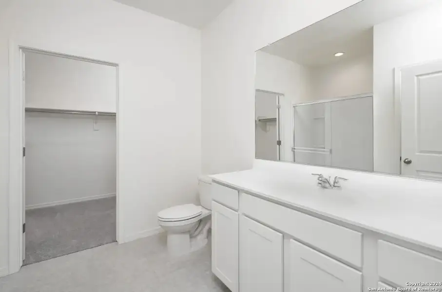 Furnished interior view inside a new home in Hennersby Hollow, San Antonio (Image 11).