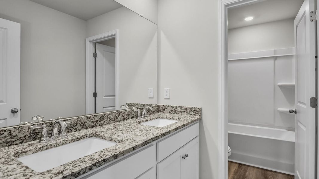 Furnished interior view inside a new home in Magnolia Ridge at Blake Farm, Wilmington (Image 16).