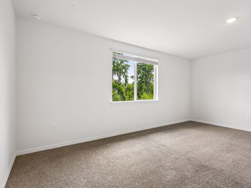 Spacious, unfurnished interior of a new home in The Grove at Stuart Crossing - Signature Series, Bartow (Image 17). Spacious, unfurnished interior of a new home in The Grove at Stuart Crossing - Signature Series, Bartow (Image 17).