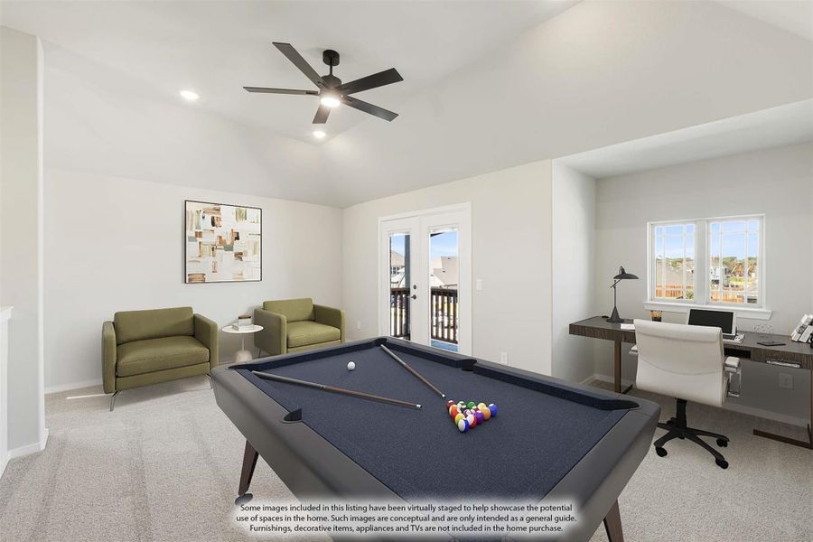 Game room with pool table, seating area, built-in desk, ceiling fan, and French doors to balcony