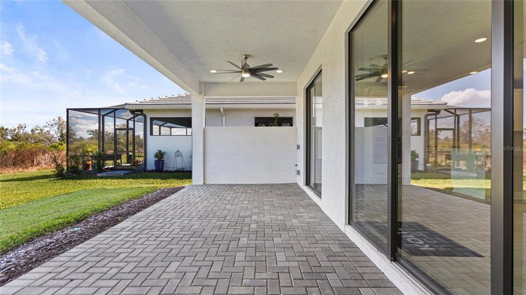 Exterior details and patio area of a home in Cresswind Lakewood Ranch, Lakewood Ranch (Image 18).
