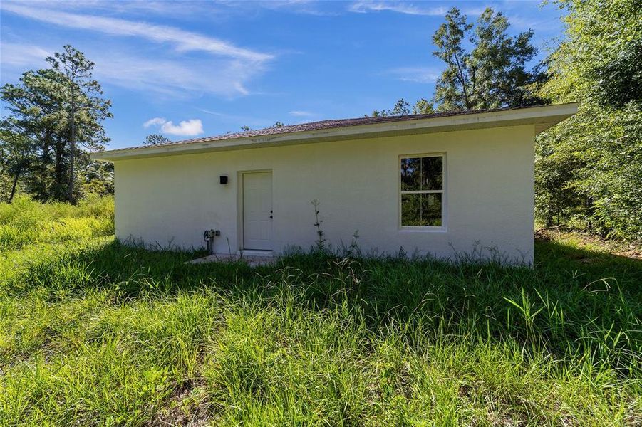 Front exterior of a new home in , Ocala, FL, highlighting curb appeal (Image 22). Front exterior of a new home in , Ocala, FL, highlighting curb appeal (Image 22).