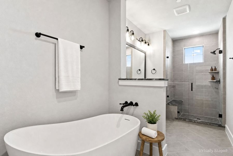 Furnished interior view inside a new home in The Tribute, The Colony (Image 27).