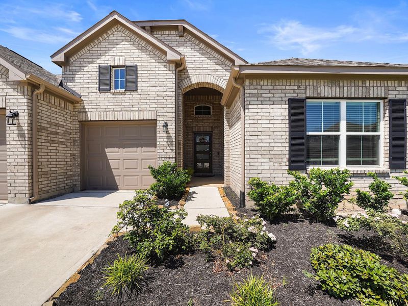 Front exterior of a new home in , Katy, TX, highlighting curb appeal (Image 21). Front exterior of a new home in , Katy, TX, highlighting curb appeal (Image 21).