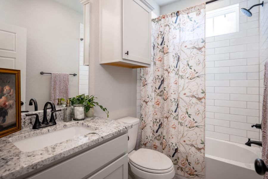 Furnished interior view inside a new home in Greens Prairie Reserve, College Station (Image 31).