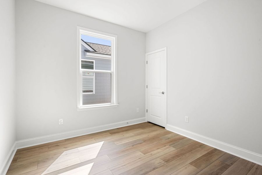 Spacious, unfurnished interior of a new home in Sun City Hilton Head, Bluffton (Image 17).