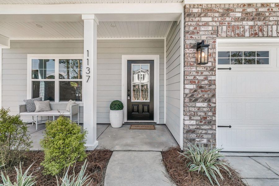 Exterior details and patio area of a home in , Charleston (Image 3).