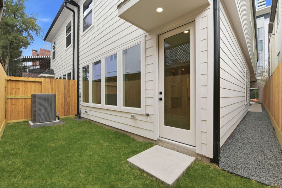 Exterior details and patio area of a home in , Houston (Image 3).