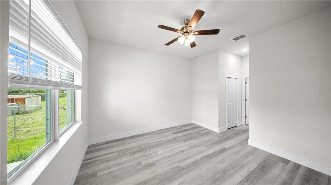 Spacious, unfurnished interior of a new home in , Port Charlotte (Image 17).