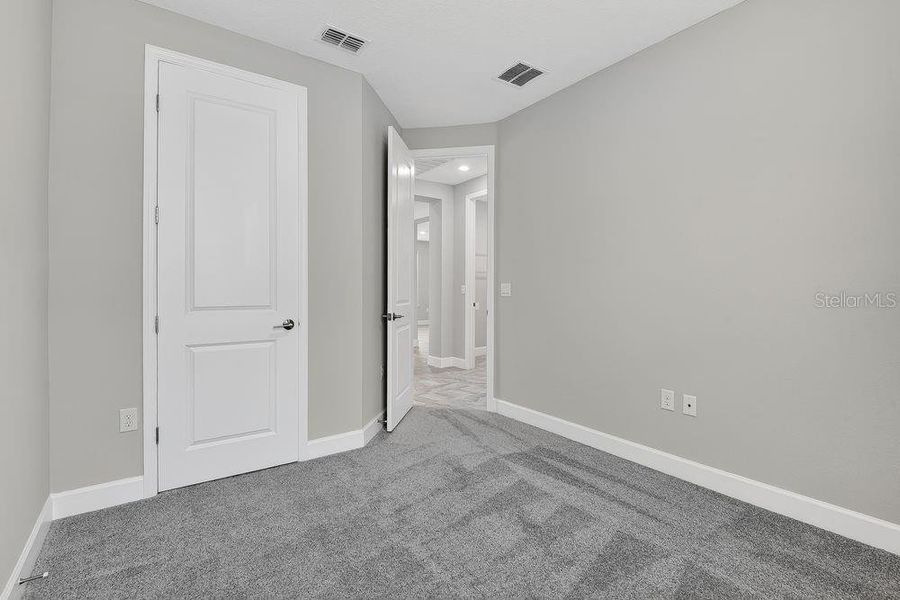 Spacious, unfurnished interior of a new home in Colbert Landings, Palm Coast (Image 23).