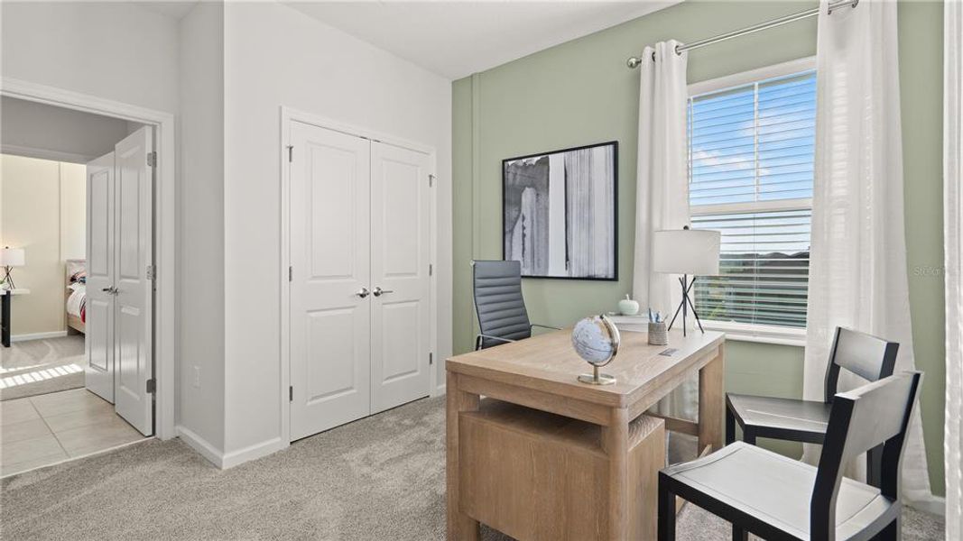 Furnished interior view inside a new home in Wellness Ridge, Clermont (Image 8).