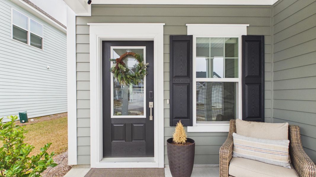 Exterior details and patio area of a home in Hewing Farms, Summerville (Image 27).