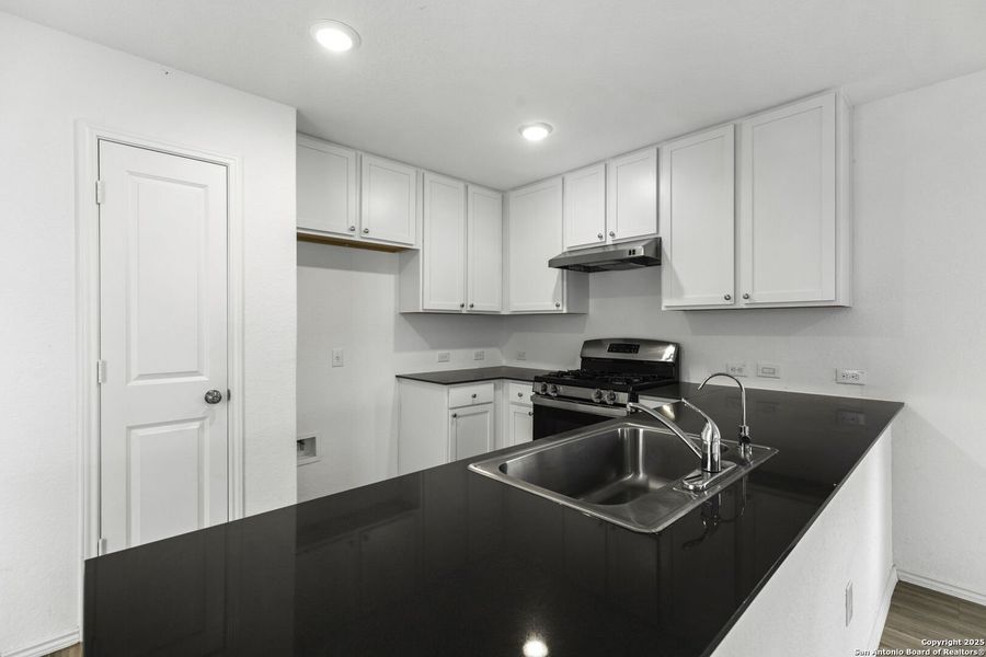 Furnished interior view inside a new home in Presa Point, San Antonio (Image 8).