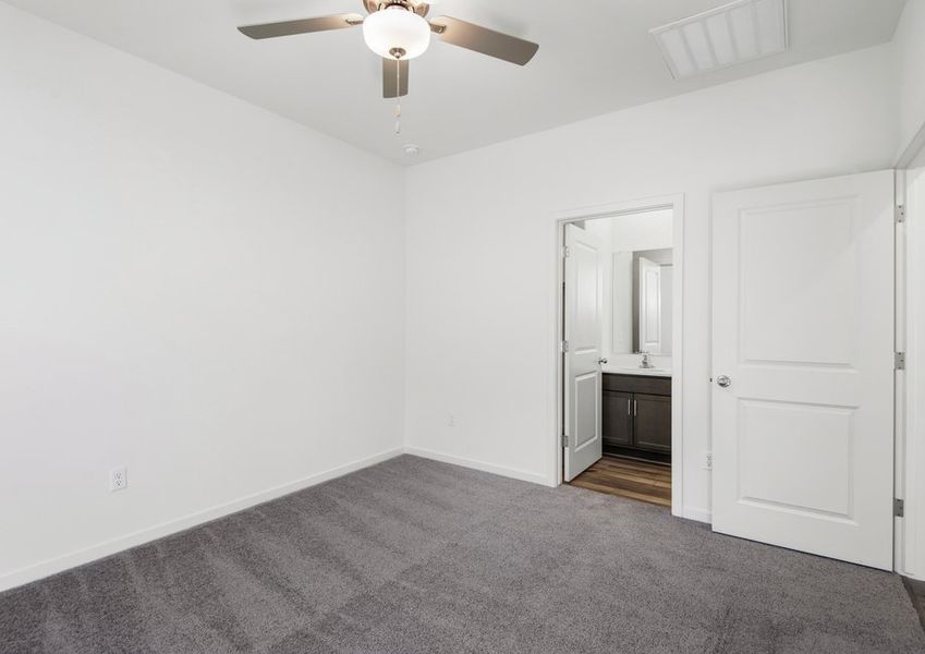 The master suite has a private master bath attached.