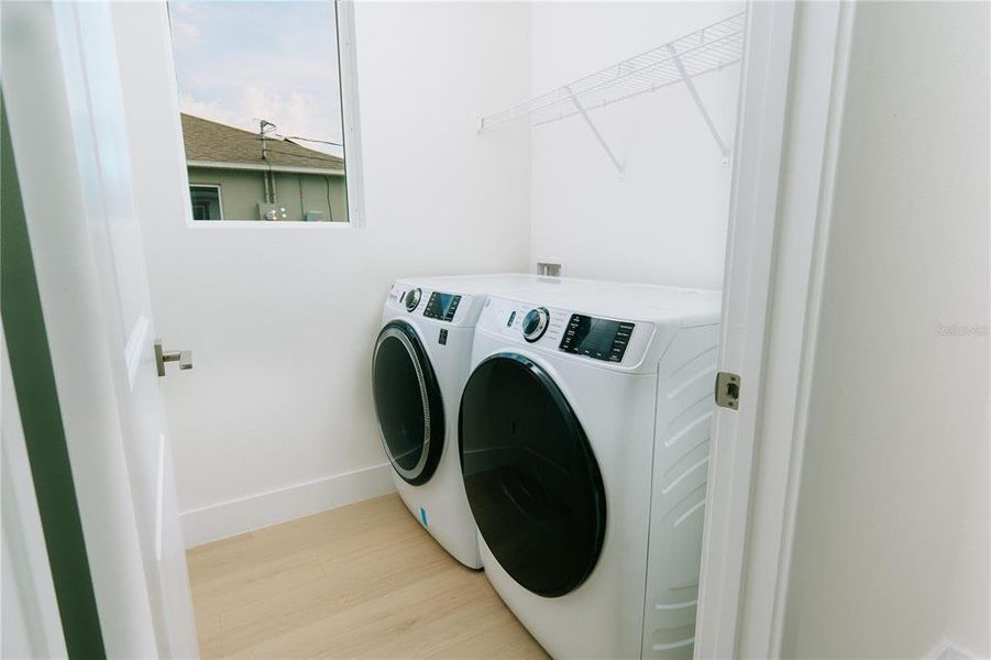 Laundry room with energy efficient washer and dryer