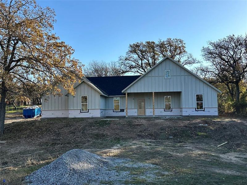 View of front of property featuring covered porch