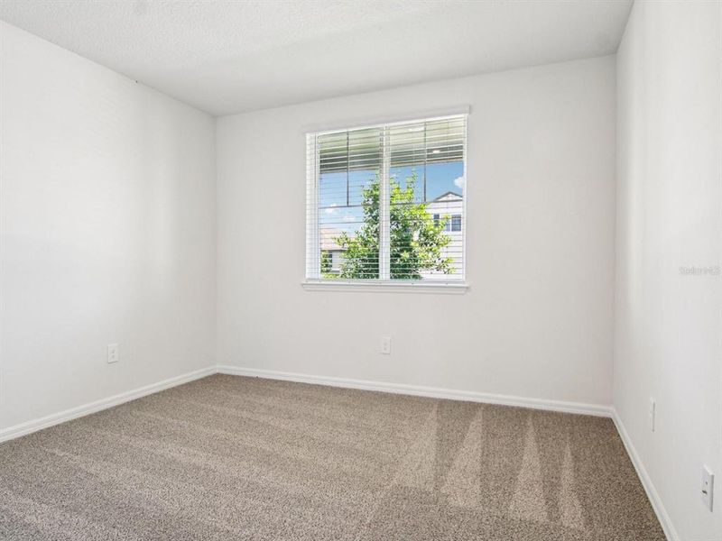 Spacious, unfurnished interior of a new home in Two Rivers - Signature Series, Zephyrhills (Image 9).