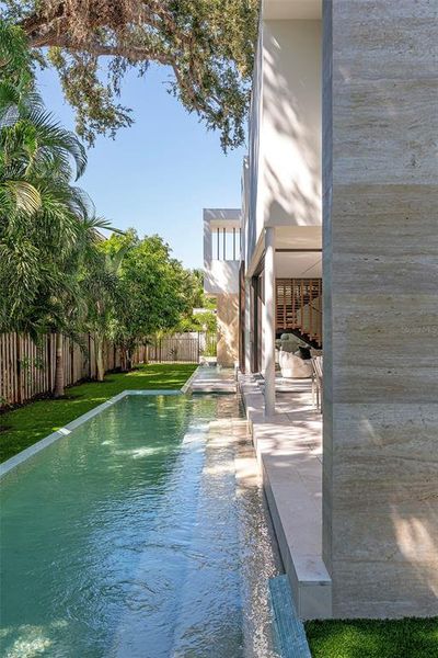 Exterior details and patio area of a home in , Sarasota (Image 35).