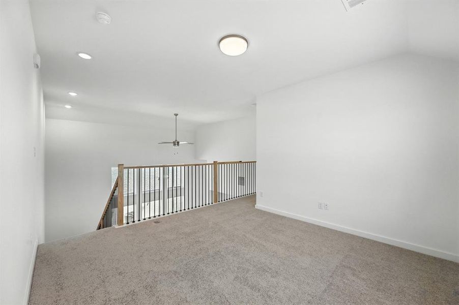 Empty room with a ceiling fan, carpet, and recessed lighting