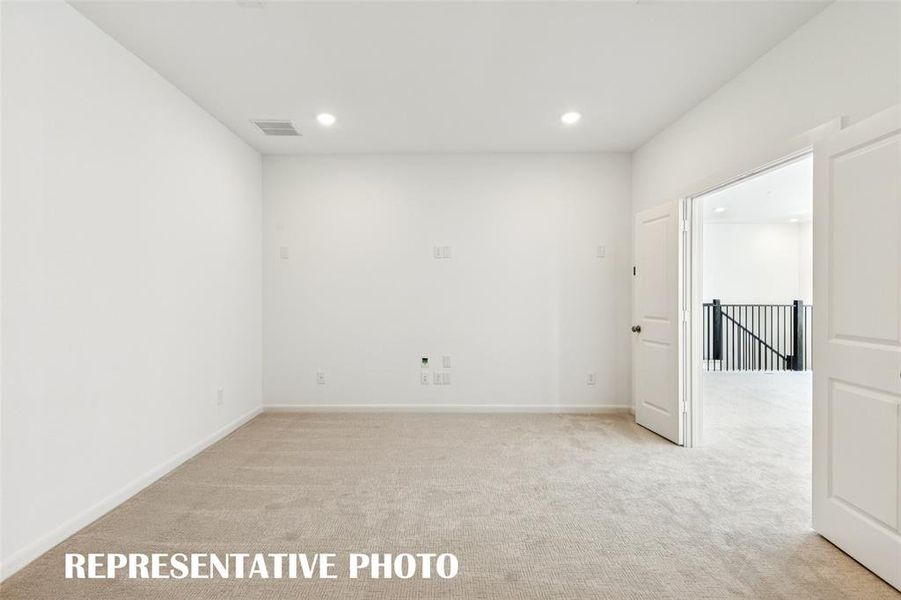 The spacious media room and adjacent game room create the ultimate entertainment zone! REPRESENTATIVE PHOTO The spacious media room and adjacent game room create the ultimate entertainment zone! REPRESENTATIVE PHOTO