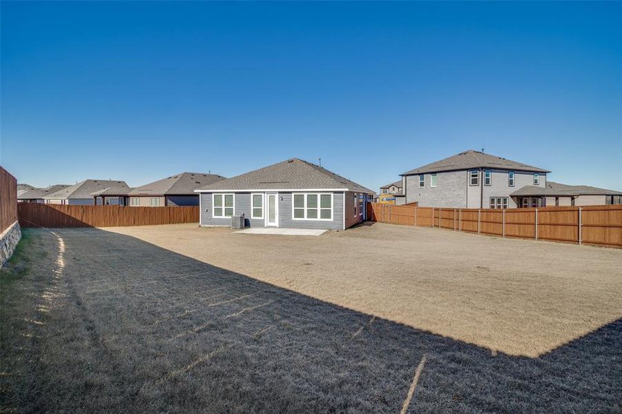 Exterior details and patio area of a home in Heartland, Crandall (Image 3).