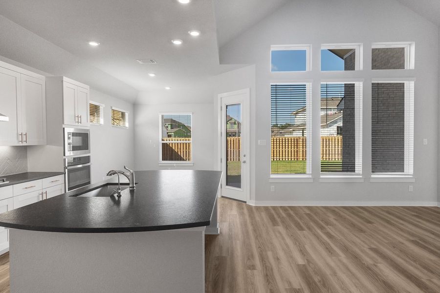 Furnished interior view inside a new home in The Grove at Blackhawk, Pflugerville (Image 11). Furnished interior view inside a new home in The Grove at Blackhawk, Pflugerville (Image 11).