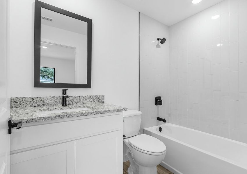 Get ready for your day in the master bathroom