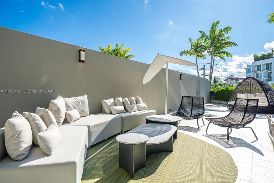 Exterior details and patio area of a home in , Bay Harbor Islands (Image 24).