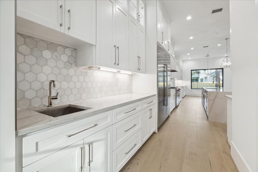 Kitchen has a second sink + an abundance of cabinets Kitchen has a second sink + an abundance of cabinets