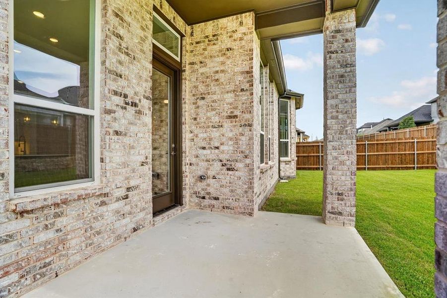 Exterior details and patio area of a home in Tavolo Park, Fort Worth (Image 21). Exterior details and patio area of a home in Tavolo Park, Fort Worth (Image 21).