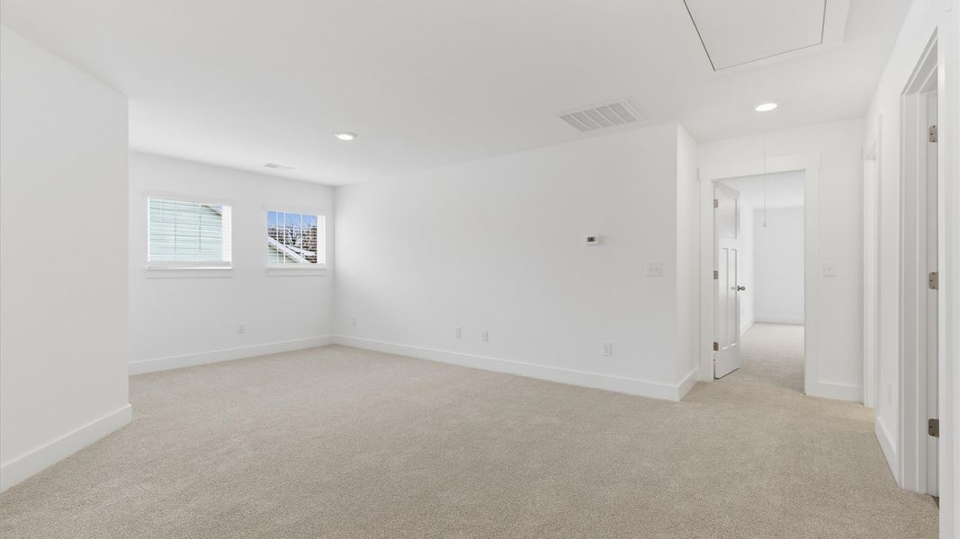 Furnished interior view inside a new home in Village at Midway, Anderson (Image 23).