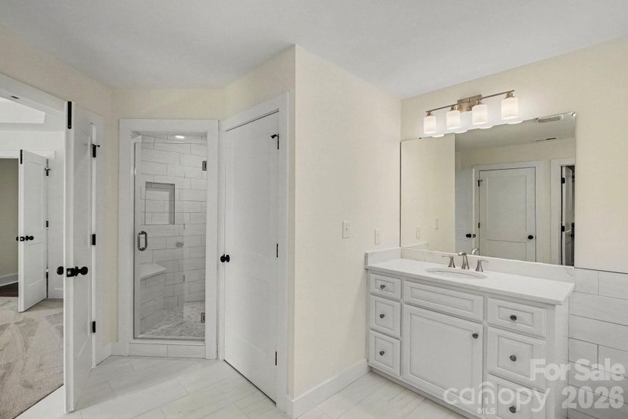 Beautifully tiled bathroom and walk in shower Beautifully tiled bathroom and walk in shower