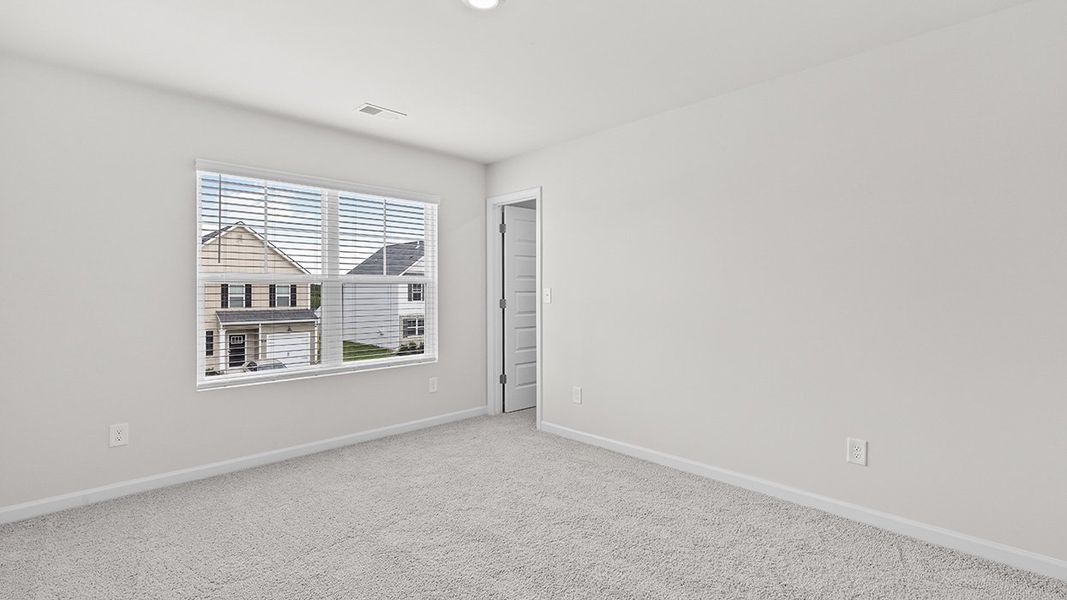 Spacious, unfurnished interior of a new home in Bellemeade Landing, Augusta (Image 24).